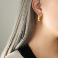 Twisted Chunky Hoop Earrings Gold and Steel Finishes view 7