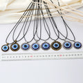 Black Cord Round Blue Evil Eye Pendant Necklaces in Eleven Frames view 5