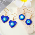Gold Tone Blue Evil Eye Hook Earrings in Heart and Round Shapes view 5
