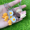 Three Charm Dumpling Egg Coffee Bean and Fish Cake Keychains view 1
