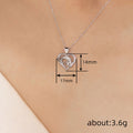 Silver Tone Open Heart Pendant Necklaces In Two Designs view 4