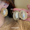 Ribbed Oval Frame Pearl Statement Stud Earrings in Gold and Silver view 2