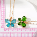 Gold Tone Faceted Crystal Butterfly Pendant Necklaces view 5