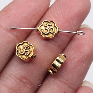 Floral Om Symbol Small-Hole Metal Bead in Two Antique Finishes