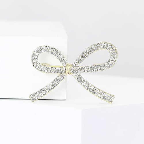 Silver pavé crystal bow brooch close-up