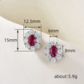 Red Oval Solitaire Halo Stud Earrings In Silver Tone view 4