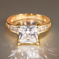 Square Clear Solitaire Channel Band Ring In Polished Gold Tone view 3