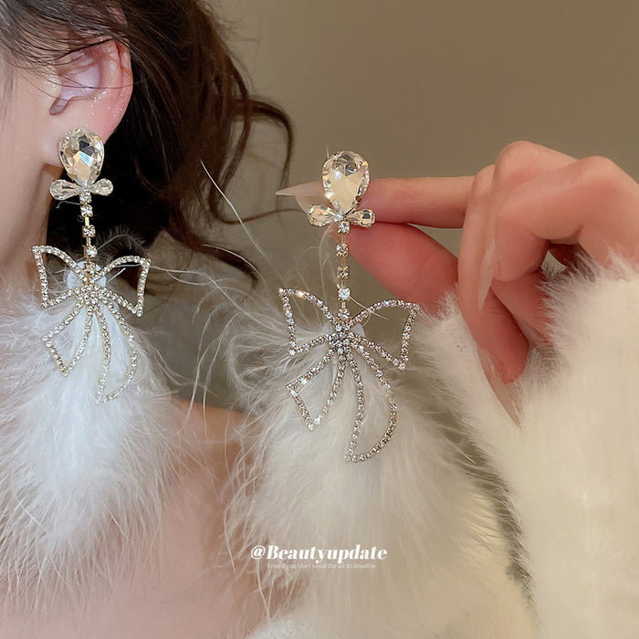 White Feather and Crystal Bow Dangle Stud Earrings