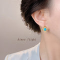 Gold Filigree Four Petal Stud Earrings Turquoise Center Stone view 2