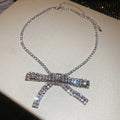 Crystal Bow Pendant Necklaces in Gold and Silver Tones view 7