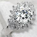 Oversized Round Solitaire Floral Halo Ring In Three Stone Colors view 2