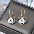Gold Tone Crystal Heart Star and Evil Eye Hook Earrings view 3