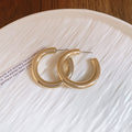 Gold Tone Textured C Hoop Earrings Four Styles With Decorative Metal Accents view 9