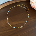 Delicate Gold Tone Necklace with Small Pastel Beads view 6