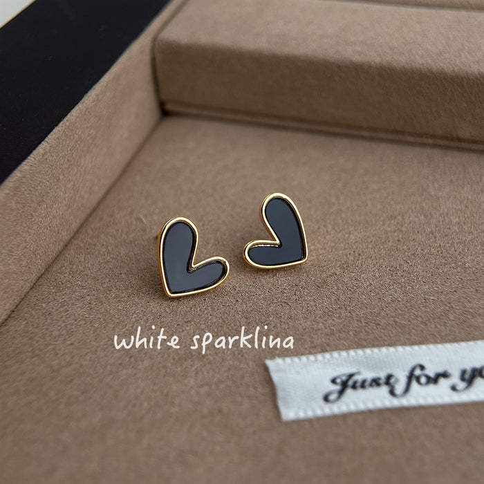 Gold Tone Heart Stud Earrings In Black And White Enamel