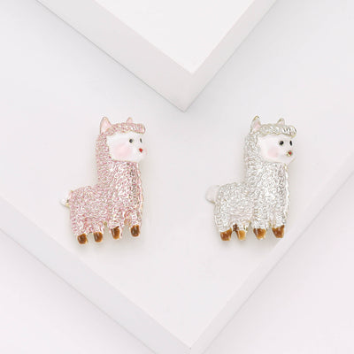 A small alpaca with a textured sparkling body shown on a white background