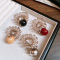 Clear Spiral Coil Hair Ties With Large Silver Or Tan Round Bead Ends view 2
