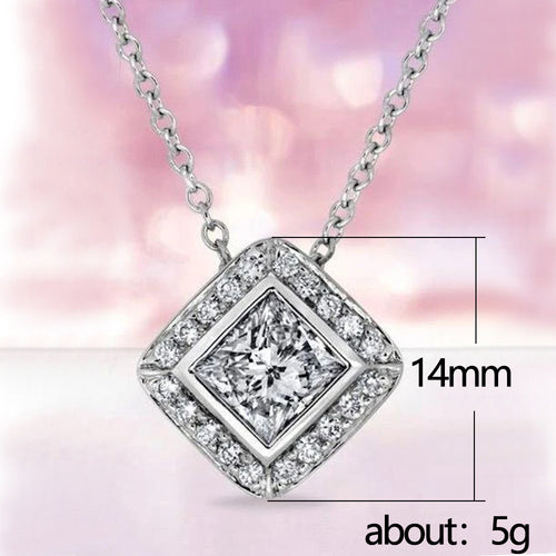Same silver diamond-shape halo pendant with printed 14mm and about 5g marks