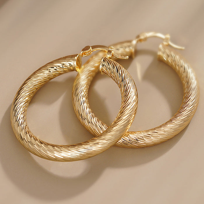 Textured Round Hoop Earrings in Gold-Tone Metal Jewelry