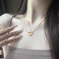 Twisted Open Heart Pendant Necklace on Fine Gold Tone Chain view 3