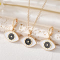 Gold Tone Enamel Eye Pendant Necklace Huggie Earrings and Sets view 4