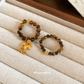 Tiger Eye Coin Horse Elastic Bead Ring Coffee Gold view 2