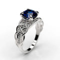 Silver Tone Blue Center Stone Intertwined Wrap Finger Ring view 1