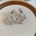 Sculpted Twisted Oval Stud Earrings in Gold and Silver Tone view 7