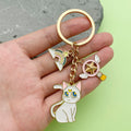 Cat Charm Keychains Featuring White Cat Across 35 Pictured Variations view 2