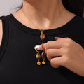 Gold Titanium Steel Tigers Eye Oval Pendant Necklace Earring Set view 4