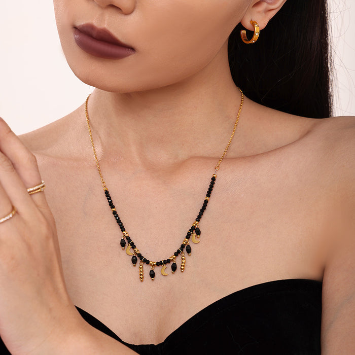 Black Crystal Moon Tassel Necklace Gold Accents Stainless
