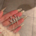 Silver Crystal Bow And Fine Chain Tassel Stud Earrings view 3