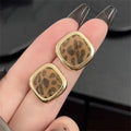 Leopard Print Square Stud Earrings with Gold Tone Frames view 1