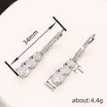 Graduated Three-Stone Long Drop Earrings In Polished Silver Tone view 4