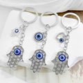 Silver Tone Rhinestone Hamsa Hand Blue Evil Eye Keychain view 1