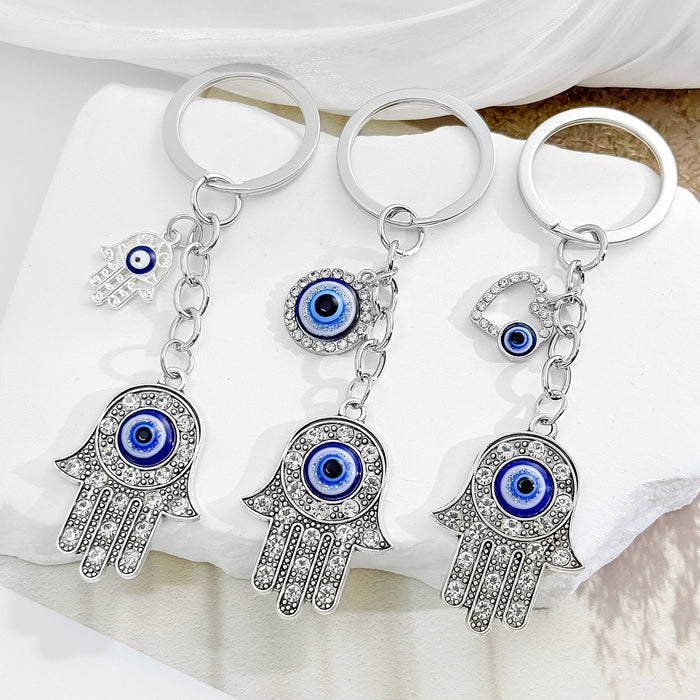 Silver Tone Rhinestone Hamsa Hand Blue Evil Eye Keychain