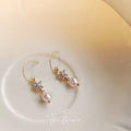 Gold Tone Clear Stone Snowflake And Pink Pearl Hook Earrings view 6