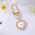 Gold Tone Crystal Heart and Sun Evil Eye Clip Keychains view 9