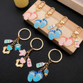 Fourteen Pink and Blue Baby Footprint Metal Keychain Designs view 3