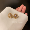 Oval Pearl Sunburst Stud Earrings in Gold Tone Fashion Jewelry Accessories view 1