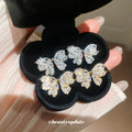 Crystal Bow Stud Earrings in Gold and Silver Tones view 3