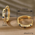 Gold Tone Star Moon Blue Clear Stone Huggie Hoop Earrings view 4