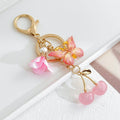 Pink Butterfly Cherry Charm Keychain with Gold Hardware view 9