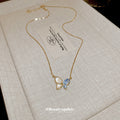 Gold Butterfly Mother of Pearl Blue Crystal Necklace view 2