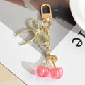 Resin Cherry Pair Charm Keychain with Gold Tone Hardware Accents view 11