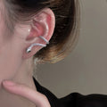 Silver Tone Crystal Snake Wrap Stud Earrings With Decorative Metal Accents view 4
