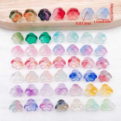 Bell flower glass beads in thirty three colors arranged as a full product overview
