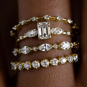 Mixed-Cut Clear Stone Four-Ring Stack Set In Polished Gold Tone