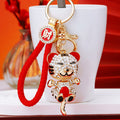 Jeweled Hugging Tiger Keychains with Braided and Bare Wrist Loops view 1