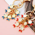 Six Fish Moonstone Keychains in Red and Blue with Assorted and Braided Options view 8